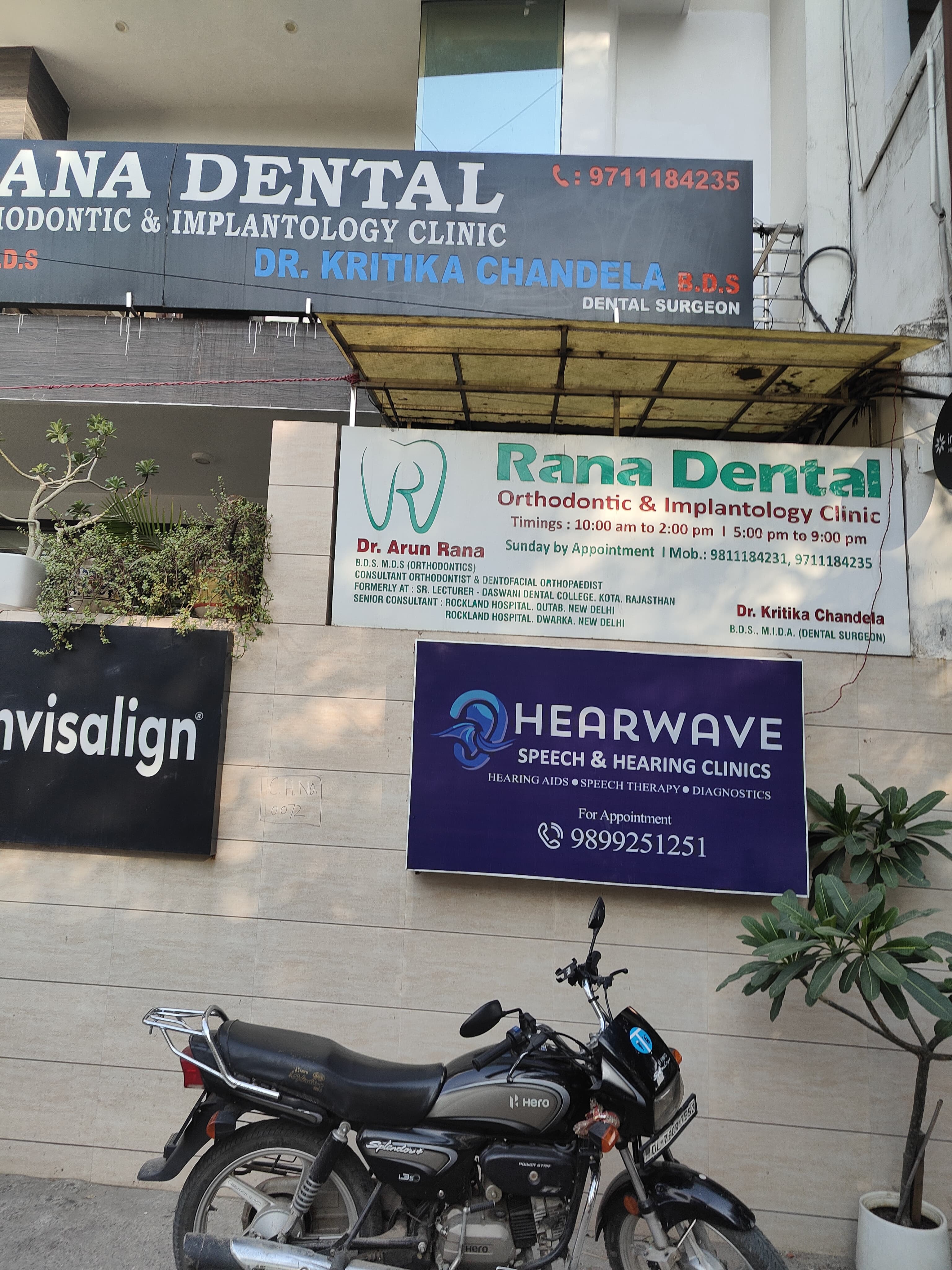 Hearwave signboard outside the clinic building at A-42, Sector 22, Noida