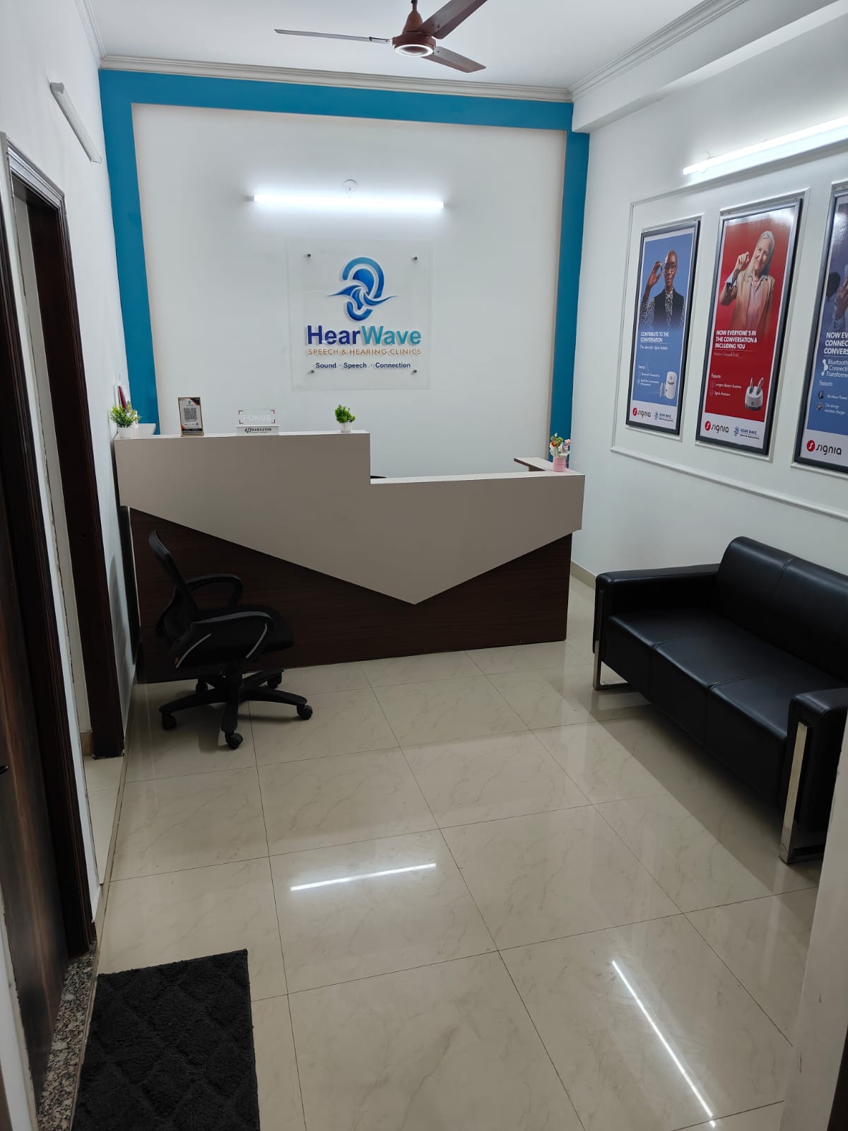 Hearwave hearing clinic consultation room — audiologist with patient, Sector 22 Noida